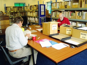 Photograph of researches working in the Glutton Bridge library